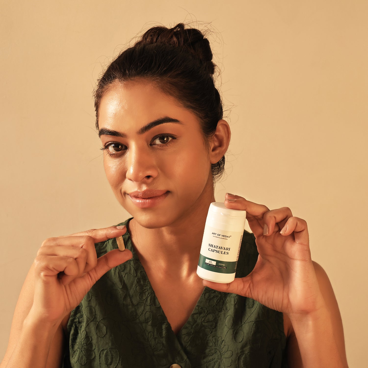 Art of Vedas Ayurveda Herbal Capsules - Woman Presenting Ayurvedic Herbal Supplement Capsules for Natural Health and Wellness